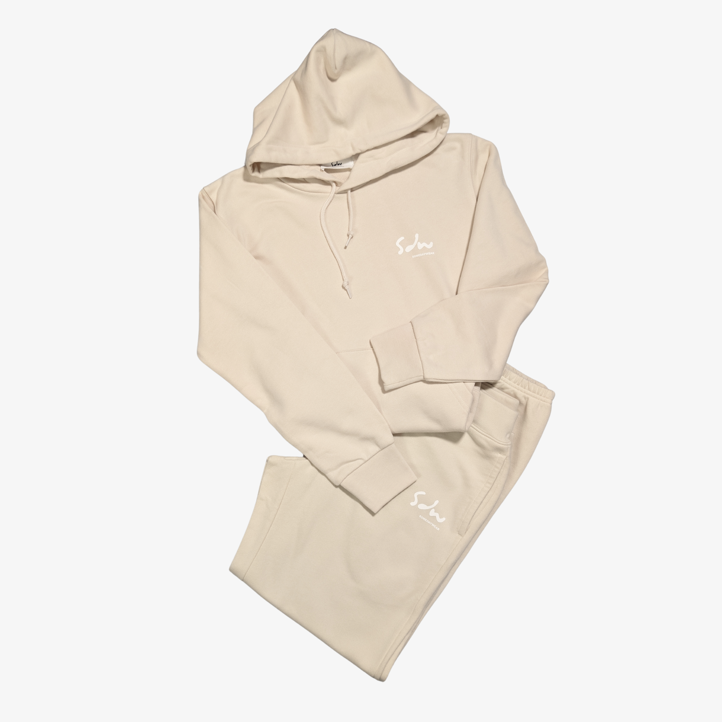 Beige hoodie & jogger set for slower days. Made from heavyweight cotton, this hoodie feels soft on the inside with enough weight to keep you warm without overheating. Comfortable for long days out or quiet time in.