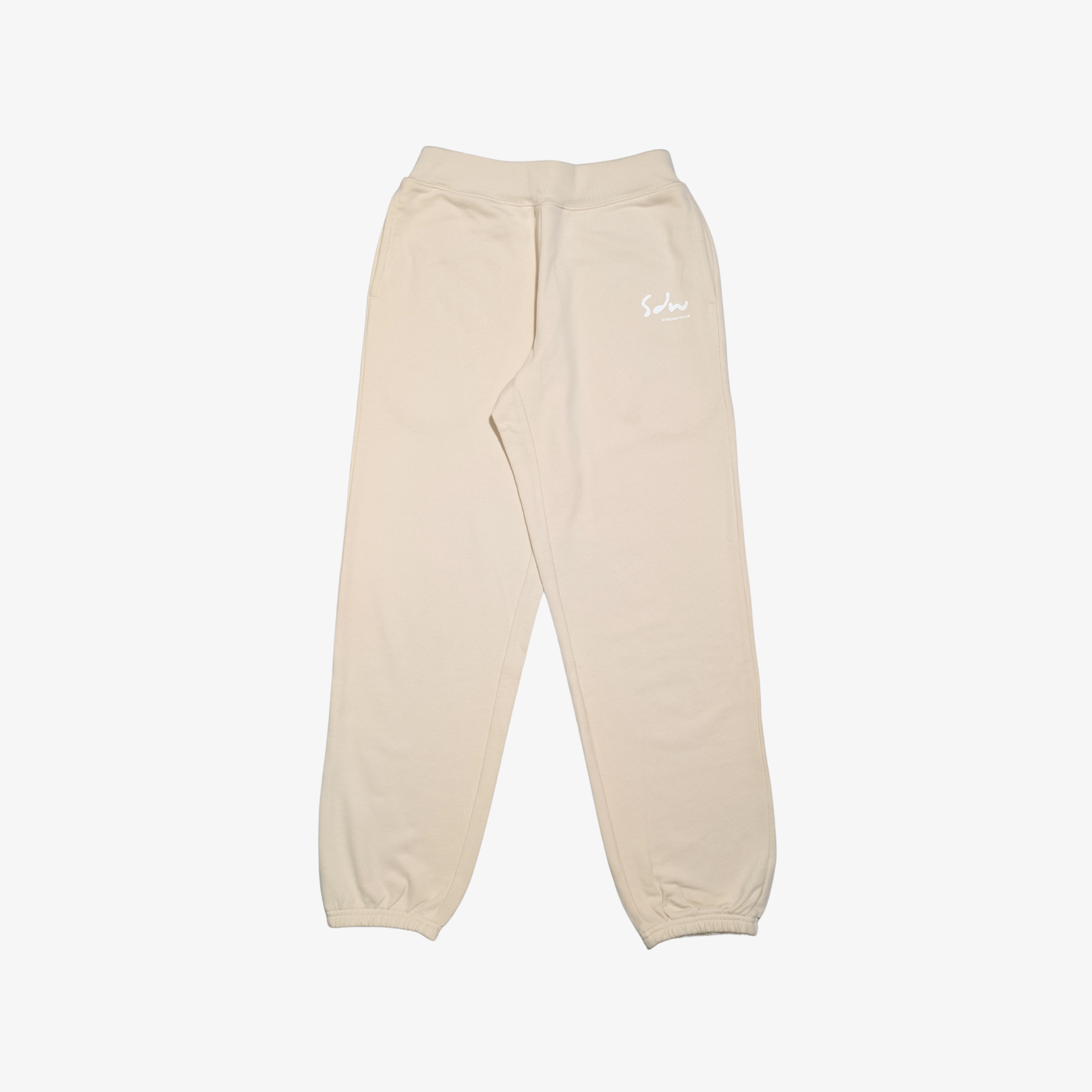Beige joggers for slower days. Made from heavyweight cotton. Comfortable for long days out or quiet time in.