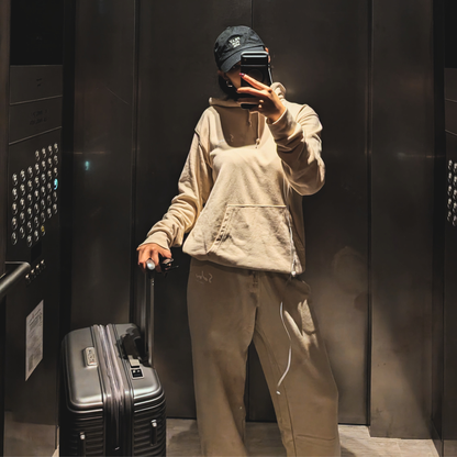 Beige hoodie & jogger set for slower days. Made from heavyweight cotton, this hoodie feels soft on the inside with enough weight to keep you warm without overheating. Comfortable for long days out or quiet time in.